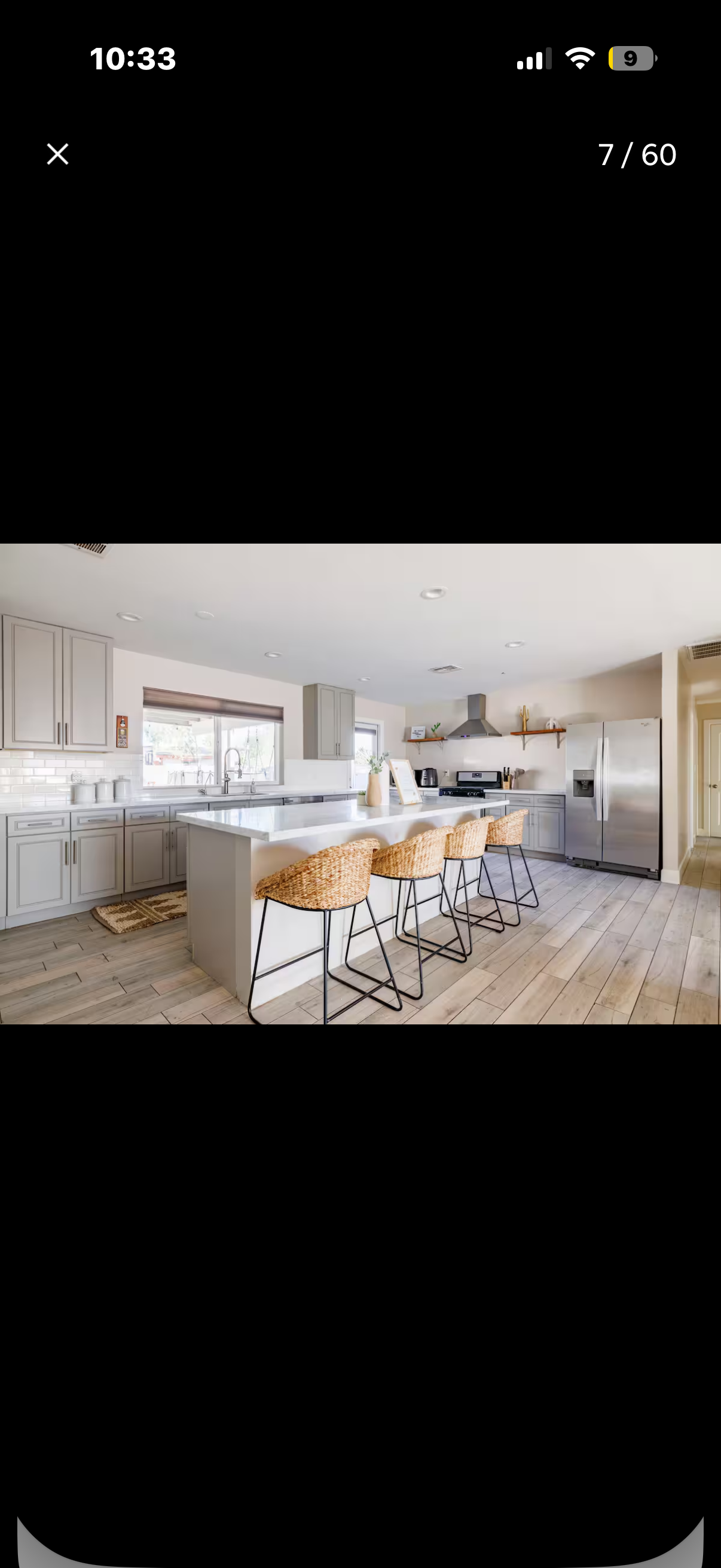 Bright open kitchen with a large island and bar seating